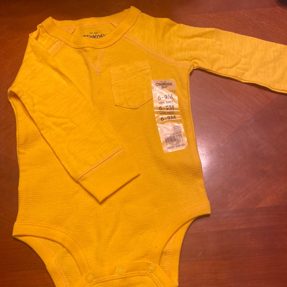 Yellow long sleeved onesie